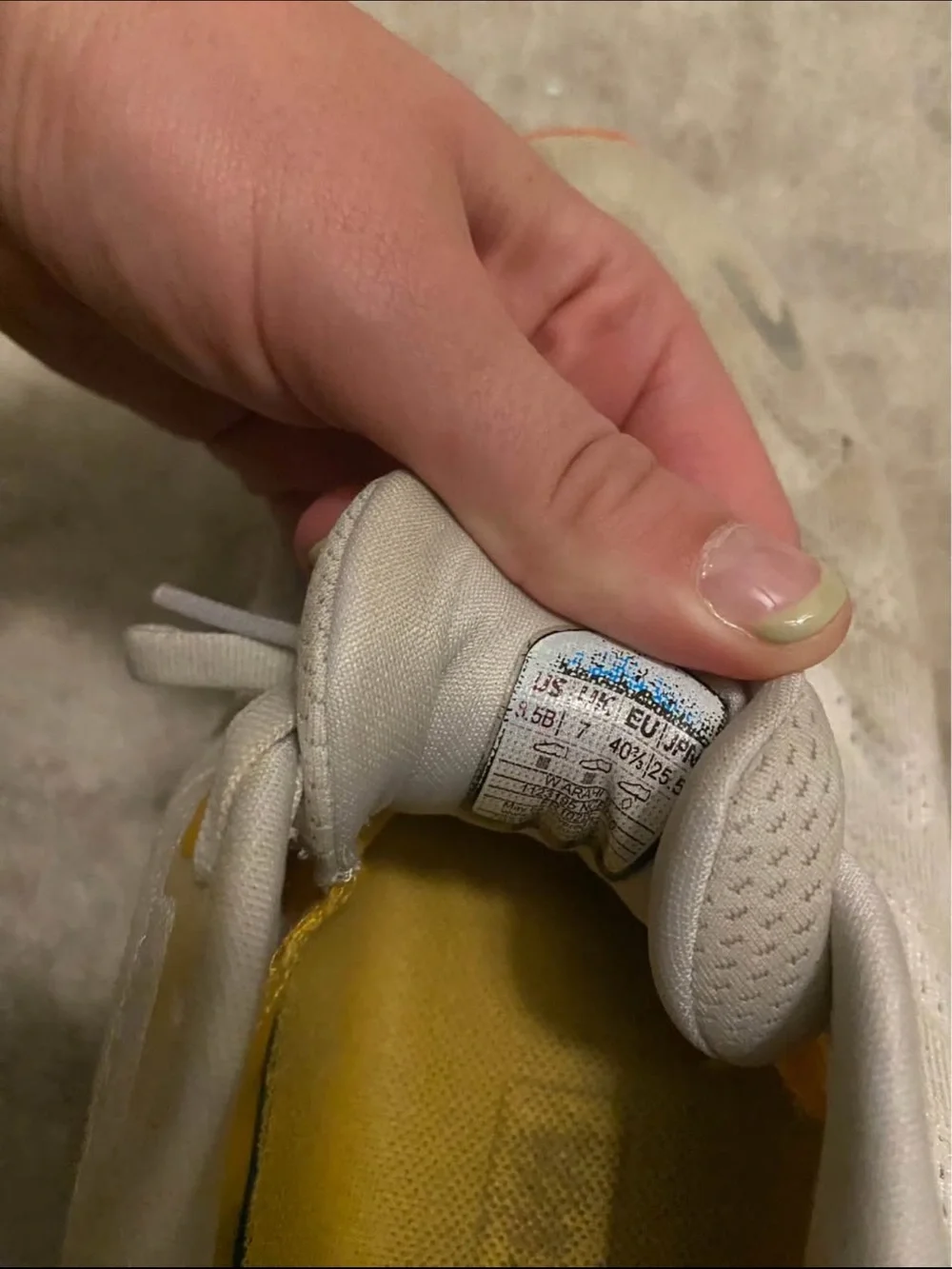 Hoka Womens Sneaker — White Upper with Yellow and Orange Sole
